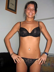 teen posing nude showing off her tanlines